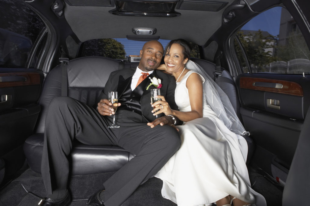 Wedding Couple in Limousine